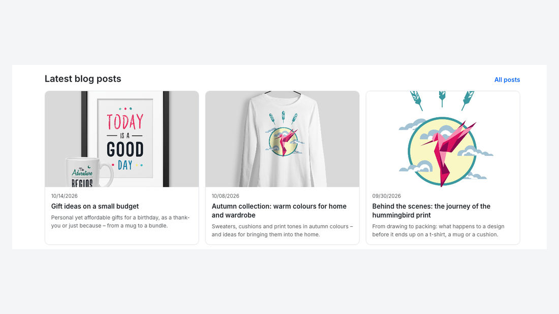 The home page of the webshop with cards of the latest three blog posts and a link to the blog