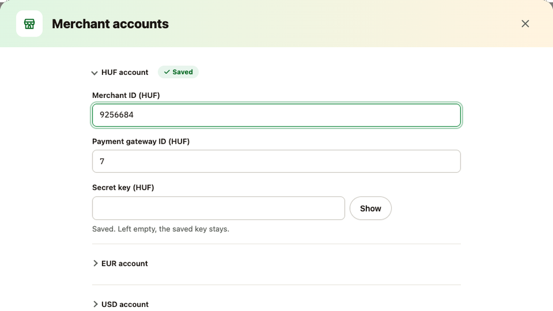 Merchant accounts dialog: merchant ID, payment gateway ID and secret key per currency